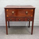 A George III inlaid mahogany rectangular writing desk, the fitted drawer over three short drawers,