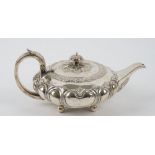 A George IV silver teapot, of squat shaped circular form,