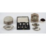 Silver and silver mounted wares, comprising; a small mantel clock,