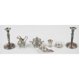 A group of Swedish silver, comprising; a pair of candlesticks, each with an octagonal tapered stem,