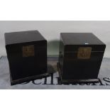 A pair of 20th century black lacquer lift top boxes, 44cm wide x 53cm high.