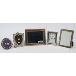 A silver mounted shaped rectangular photograph frame,