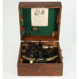 An ebonised brass sextant by Henry Hughes & Sons Ltd, circa 1955, in original fitted mahogany case.