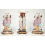 A pair of French figural comport bases and another similar, late 19th century,