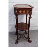 A late 19th century mahogany vitrine table with lift glazed octagonal top and sides on four square