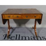 A Regency rosewood sofa table, with two real and two opposing drawers,
