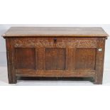 An 18th century and later oak coffer, 105cm wide x 56cm high.