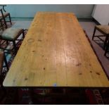 An early 20th century rectangular pine kitchen table, 208cm long x 78cm high.