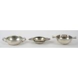 Silver, comprising; a twin handled quaich, Birmingham 1927, a twin handled bonbon dish,