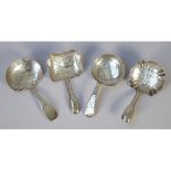 A Victorian silver tea caddy spoon, with foliate decoration to the bowl and to the handle,