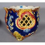 A 19th century Majolica jardiniere with pierced foliate decoration, 26cm high.