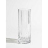 A Baccarat crystal vase of cylindrical fluted form, etched mark, 30cm high.