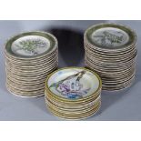 AMERICAN ATELIER; a large quantity of 20th century dinner plates with botanical decoration, (qty).