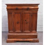 A 19th century Italian walnut side cabinet, with a pair of drawers over cupboard, on plinth base,