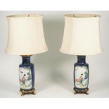 A pair of gilt metal mounted famile verte powder blue ground porcelain vases,