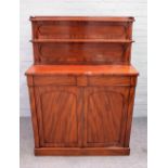 A Victorian mahogany chiffonier with double shelf back over pair of drawers and cupboards on plinth
