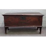 A 17th century elm plank coffer, on slab end supports, 105cm wide x 55cm high.