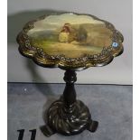 A late Victorian papier mache occasional table with painted top on turned column plinth base,