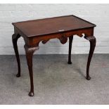 An 18th century style Irish mahogany silver table with dished rectangular top on acanthus capped