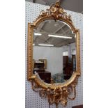 A 19th century gilt framed girandole wall mirror,