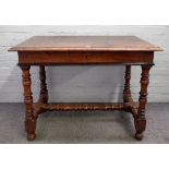 An 18th century Continental fruitwood centre table, the rectangular top with single frieze drawer,