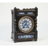 A Liberty style Arts & Crafts mantel clock,