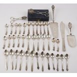 A group of foreign and plated table flatware, comprising; a Norwegian serving slice,