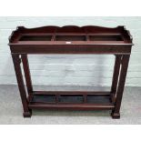 Gill & Reigate London W; a late 19th century mahogany three division stick stand,