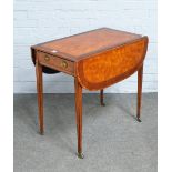 A George III mahogany banded satinwood Pembroke table, on tapering square supports,