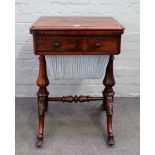 An early Victorian rosewood sewing/games table,