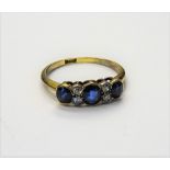 A gold, sapphire and diamond ring,