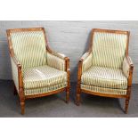 A pair of 19th century French style square back armchairs, on turned supports,