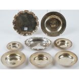 Six silver Armada style dishes in varying sizes,