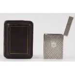 A Victorian Scottish silver rectangular visiting card case, engraved with a central cartouche,