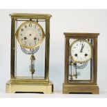 A French gilt brass cased four glass mantel clock, early 20th century, with Mercury filled pendulum,