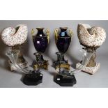 A pair of Victorian style purple glass and gilt metal mounted vases with swan handles, 35cm high,