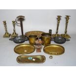 A quantity of mostly late 18th century copper and brassware including two pairs of candlesticks,