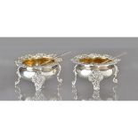 A pair of George III silver salts, each of shaped circular form,
