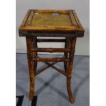An early 20th century bamboo low side table with inset tile top, 28cm wide x 44cm high.