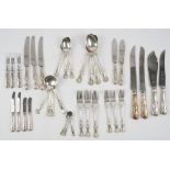 A silver King's pattern canteen of table flatware,