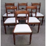 A set of six 19th century mahogany bar back dining chairs, with pierced crest rail,