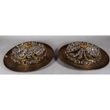 A pair of modern gilt metal circular ceiling lights of shallow dished form,