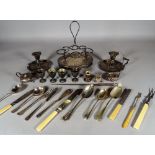 A quantity of early 20th century silver plated items including; flatware, a vinaigrette stand,