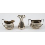 Silver, comprising; a milk jug and a matching twin handled sugar bowl,