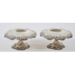 A pair of Tiffany & Co sterling silver pedestal comports each with floral,
