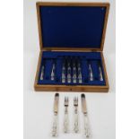 A set of six late Victorian pairs of silver King's pattern dessert or fruit knives and forks,
