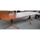 A Regency style mahogany 'D' end extending dining table on six downswept supports, one extra leaf,