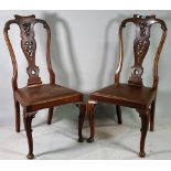 A set of four Queen Anne style mahogany vase back dining chairs, 48cm wide x 105cm high, (8).