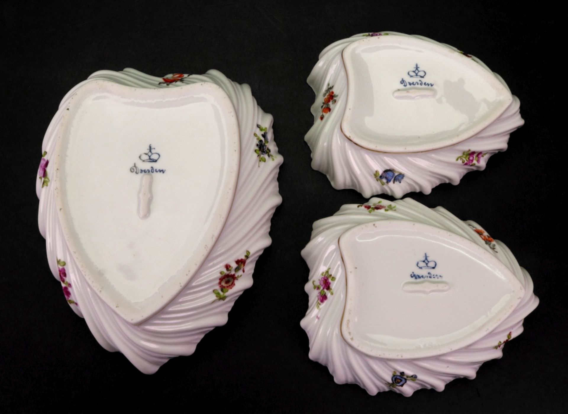 Three Dresden heart shape dishes, painted with bouquets of scattered flowers and gilded, - Image 2 of 2
