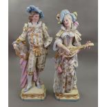 A large pair of Paris porcelain figures of a male artist and female musician, late 19th century,